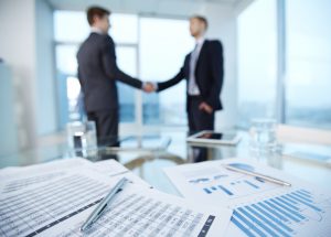 two businessmen shaking hands